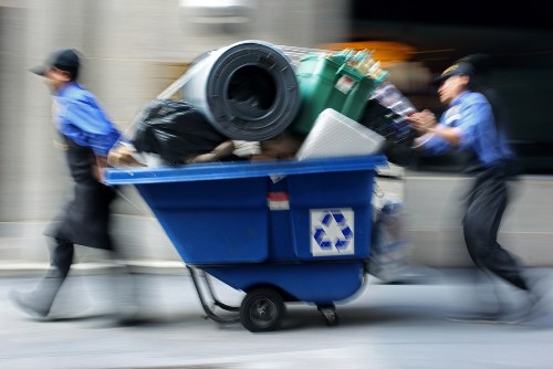 Recyclable office materials being separated into labelled bins at a Turnham Green site